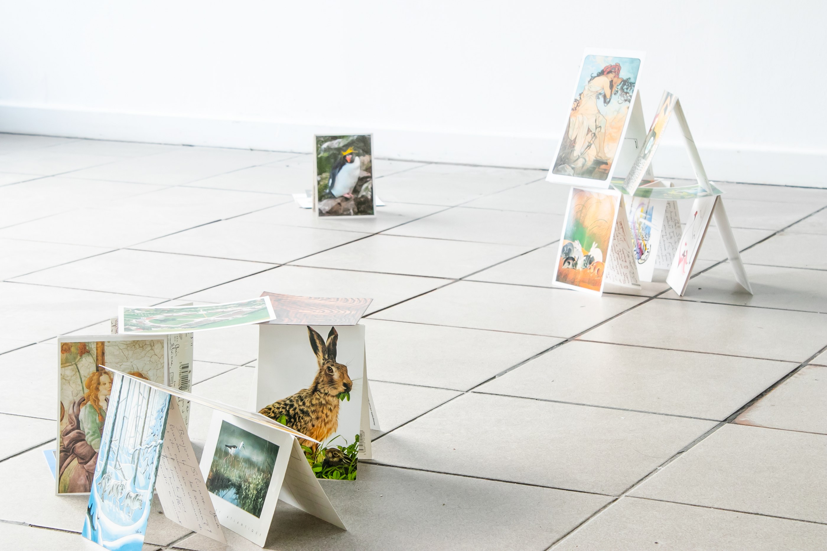 Postcards grouped spatially to form 3D pyramids