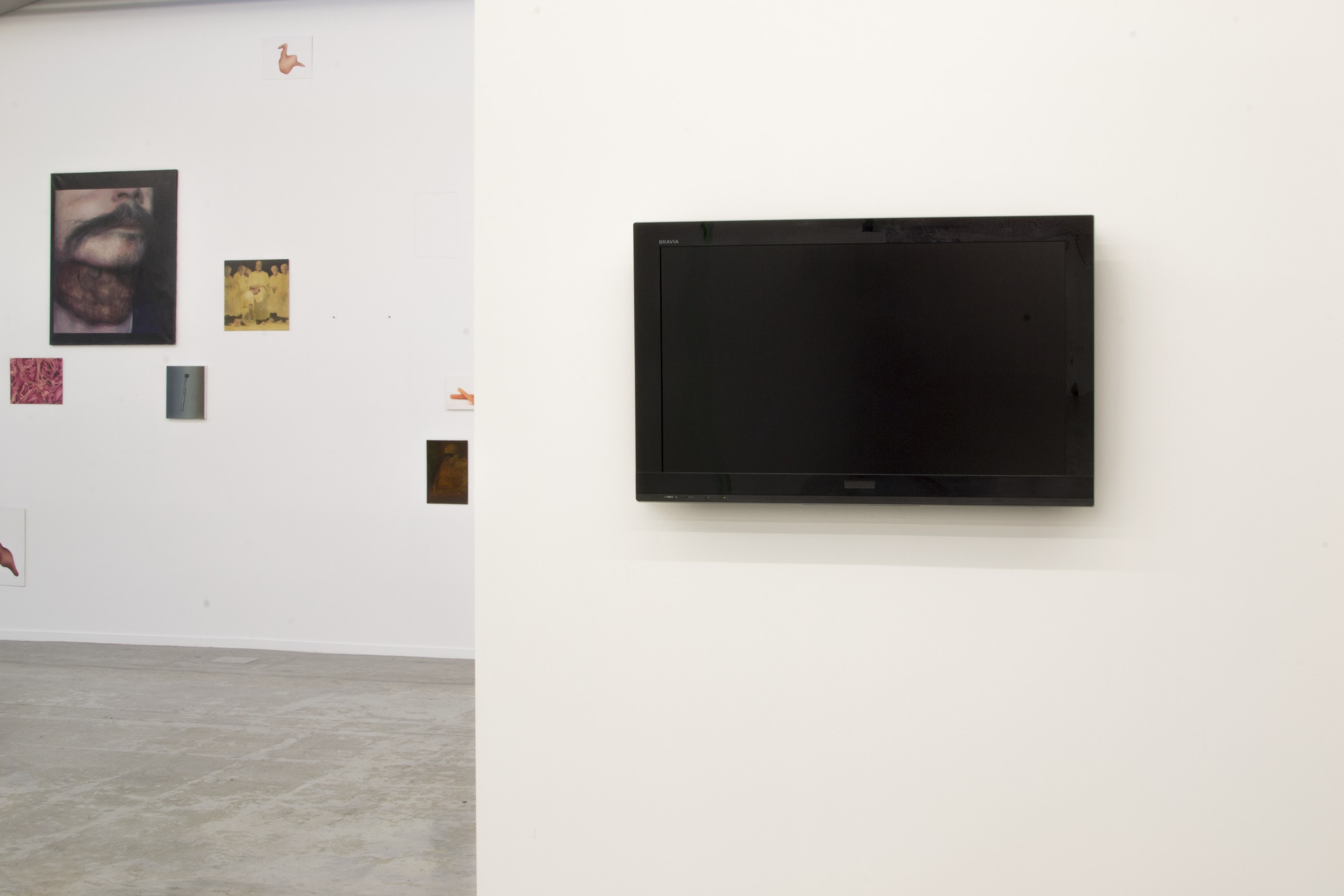 Series of 4 photos shot from an identical perspective, the first photo shows a fully black screen