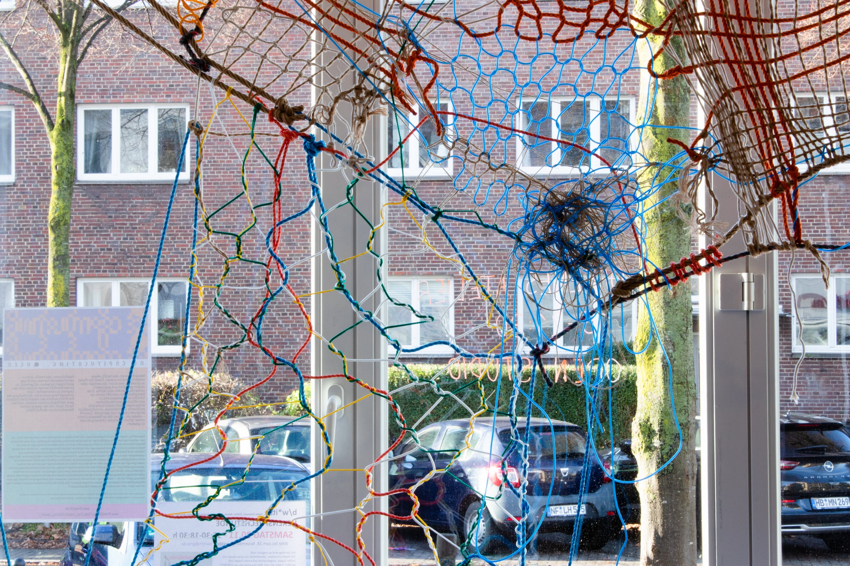 Close-up of a net showing different structures and colors